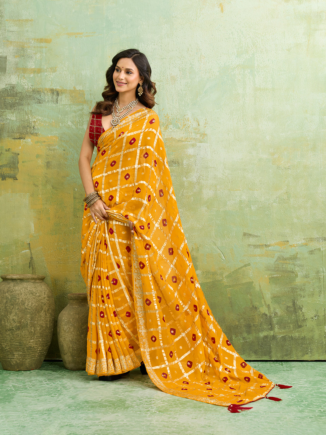 KcPc New Casual Wear BandhaniSaree With Zari Lines CHAND