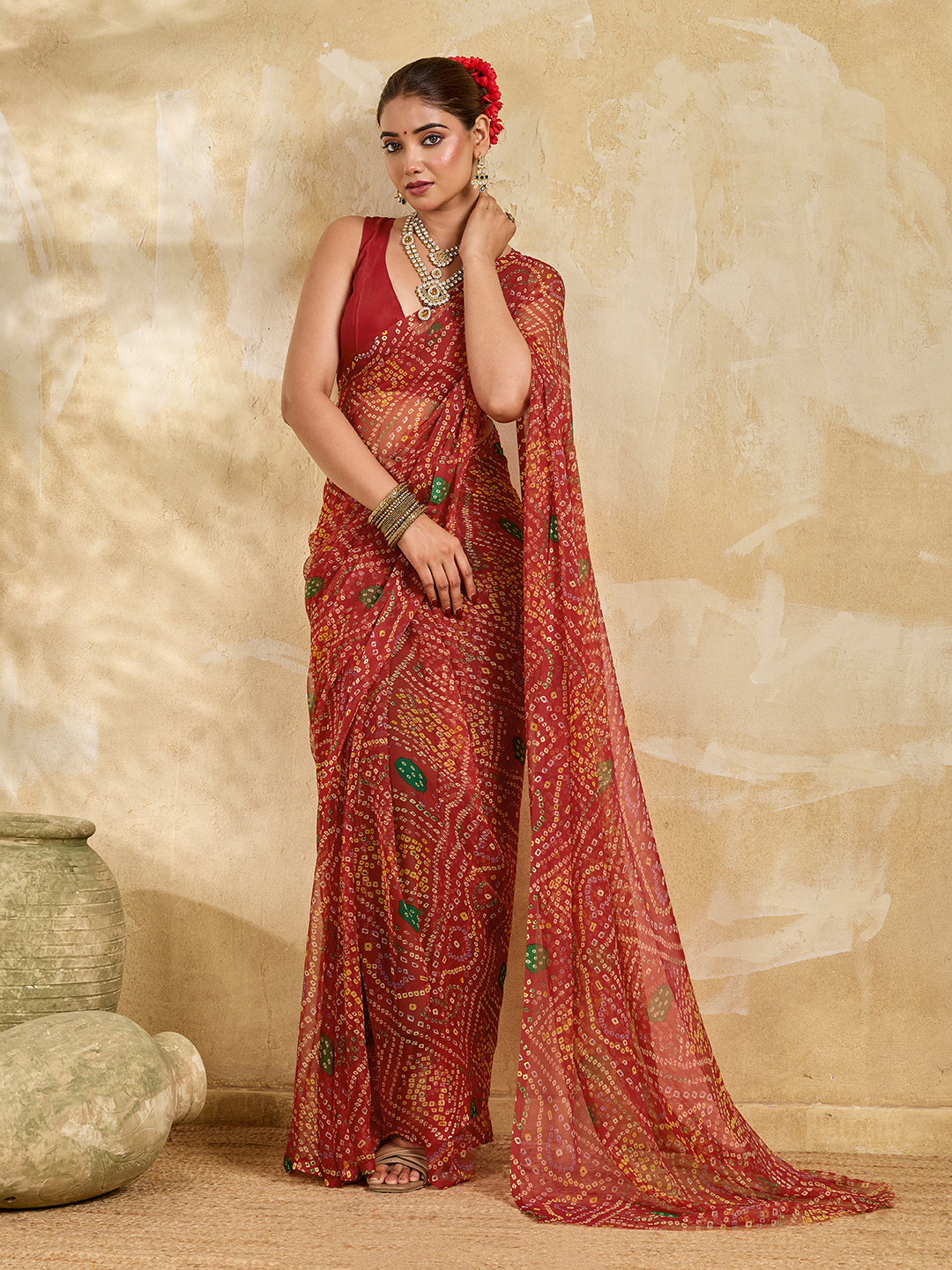 A red colour saree with bandhani style under 500