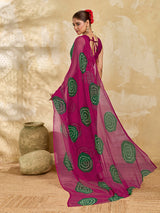 A bright pink saree with bandhani print under 500