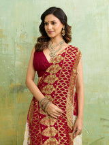 Banarasi silk saree with heavy zari work and a gharchola pattern in white and red colors