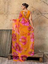 A vibrant orange and pink floral sareeGeorgette Flower Printed Style