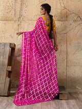 A party wear saree in Rani colour