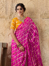 A party wear saree in Rani colour