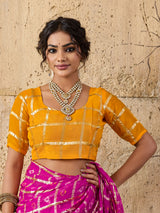 A party wear saree in Rani colour