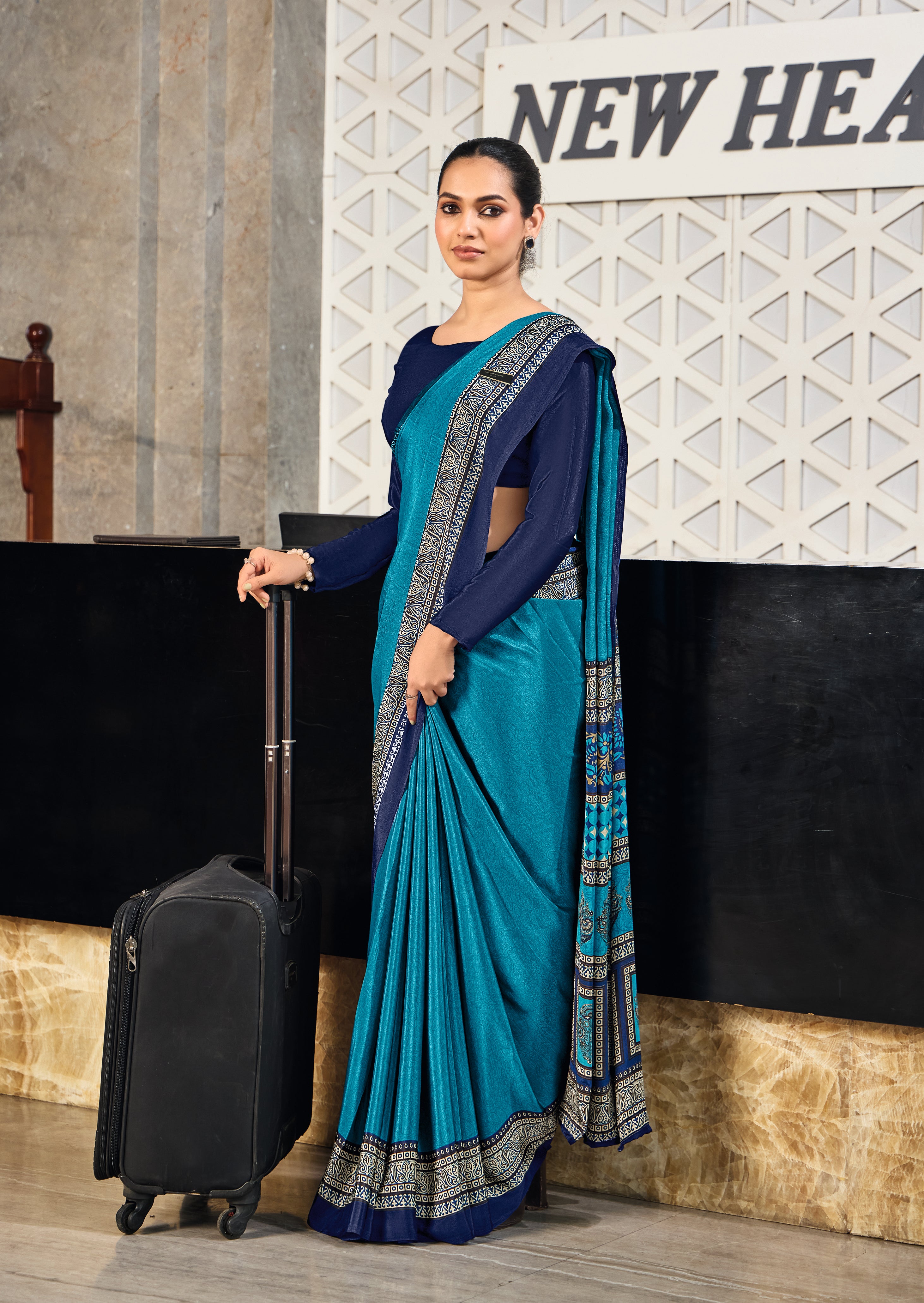 blue crepe silk saree with a geometric pattern under 1500