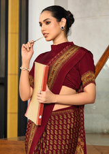 maroon crepe silk saree with a floral pattern under 1500