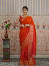 Red and orange saree with zardozi work and Banarasi style