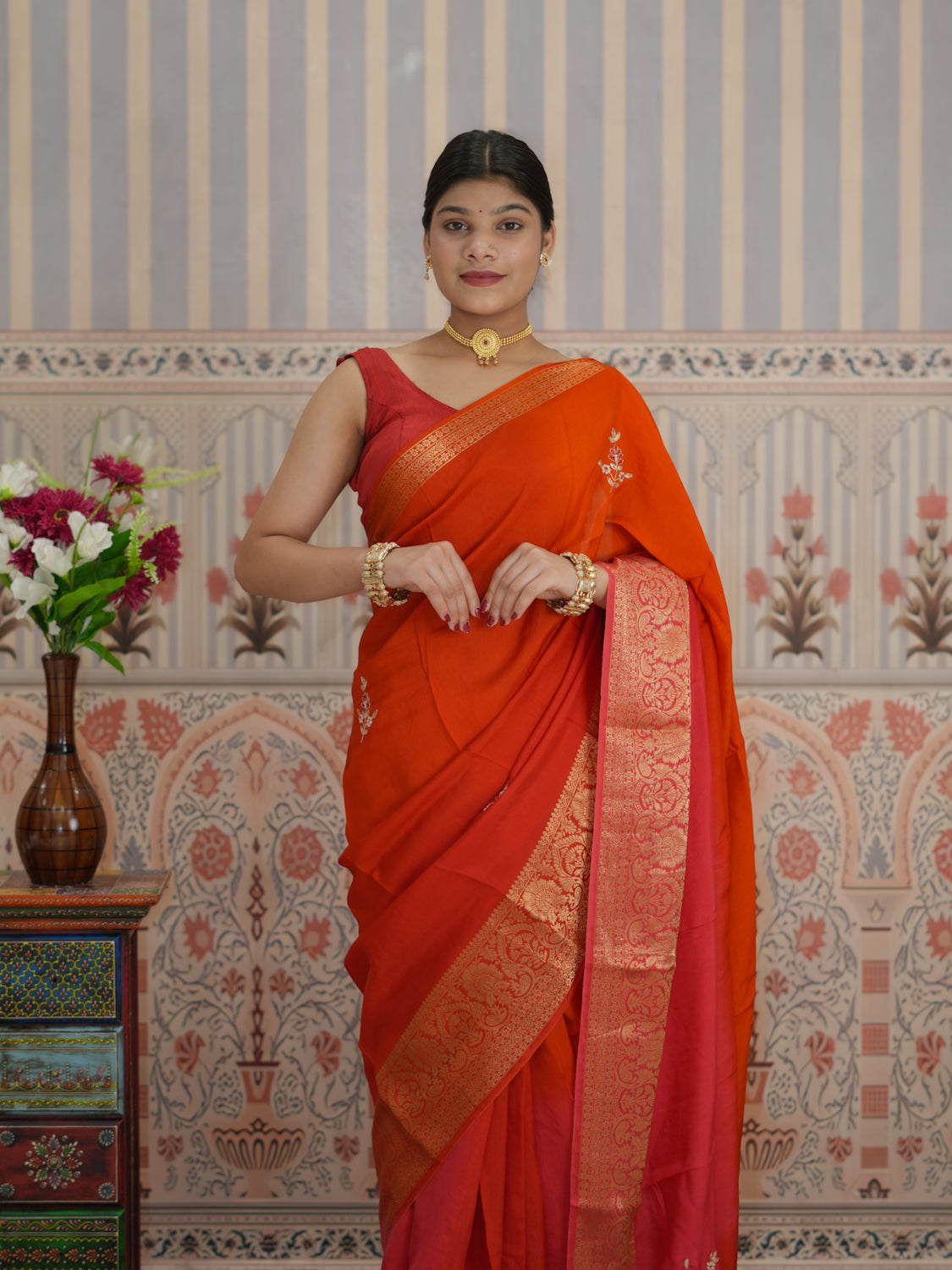 Red and orange saree with zardozi work and Banarasi style