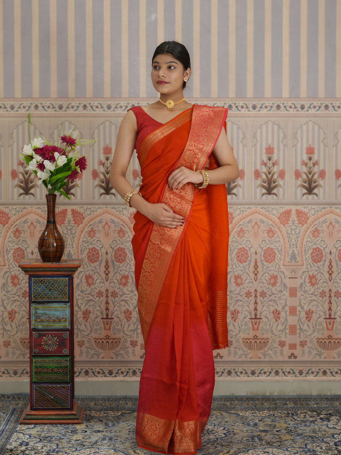 Red and orange saree with zardozi work and Banarasi style