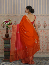 Red and orange saree with zardozi work and Banarasi style