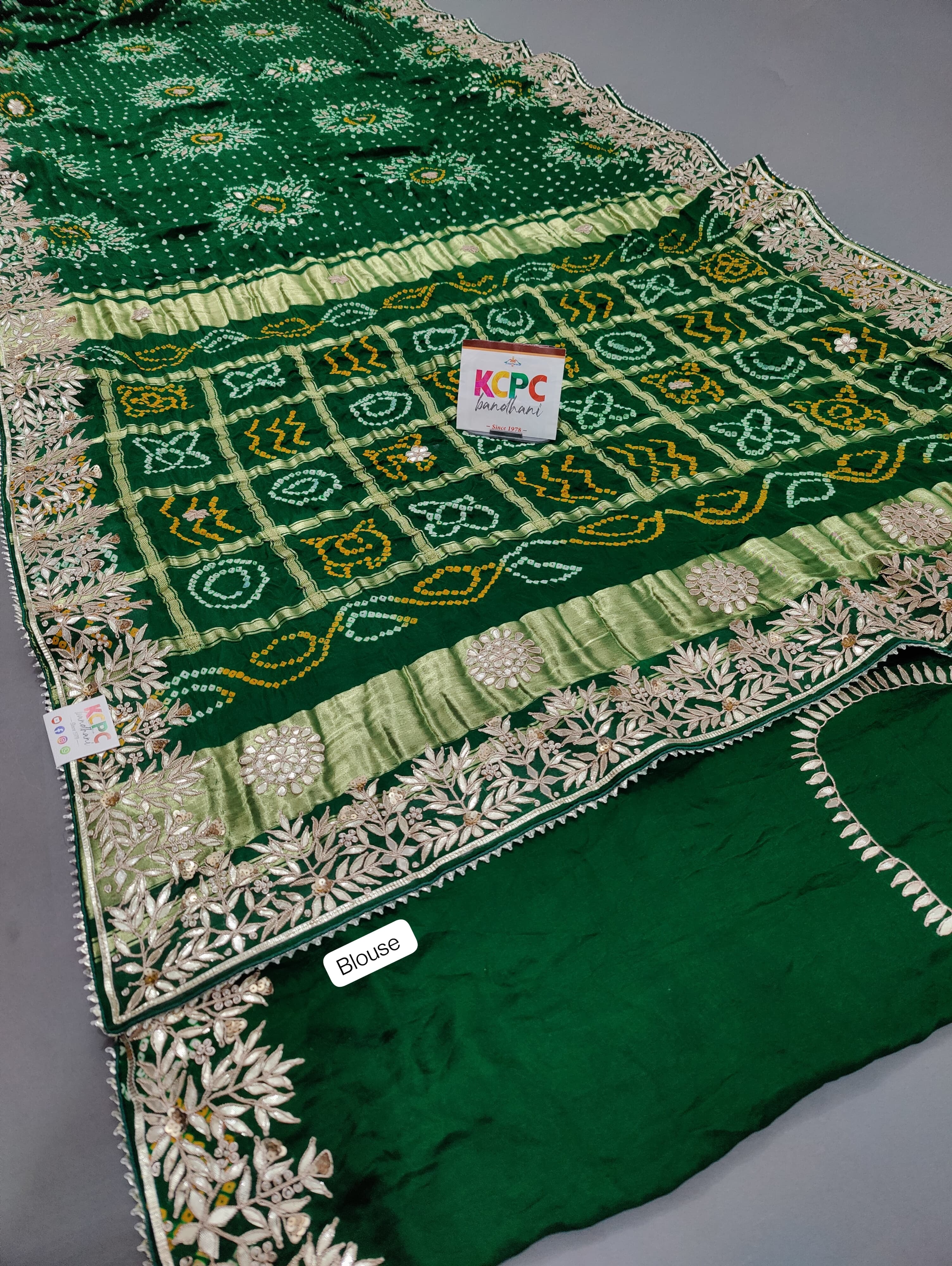 KcPc Beautiful Pure Gaji Silk Bandhani Ghatchola Gotapatti Saree AMT Green