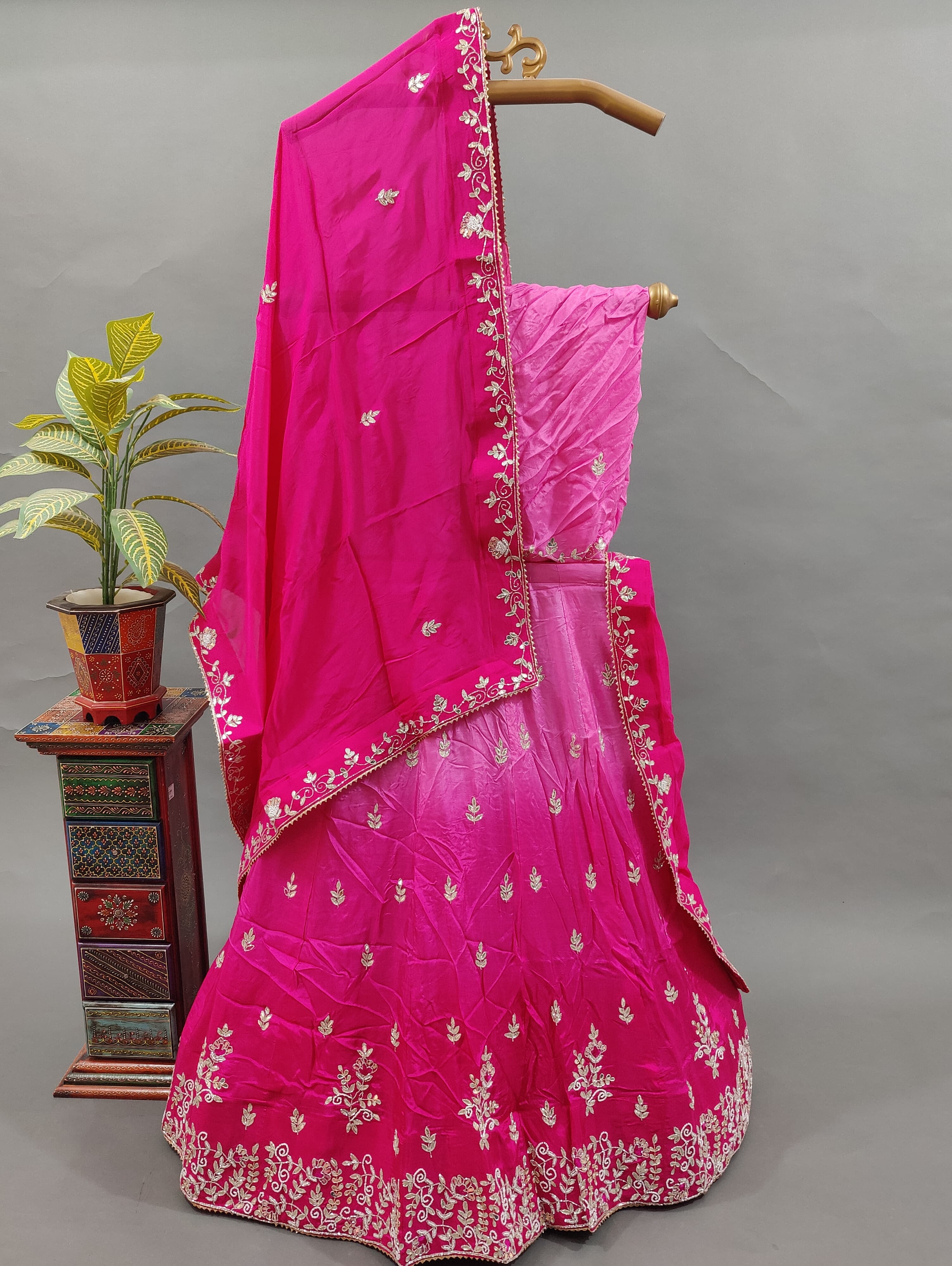 A pink lehenga with gotapati work