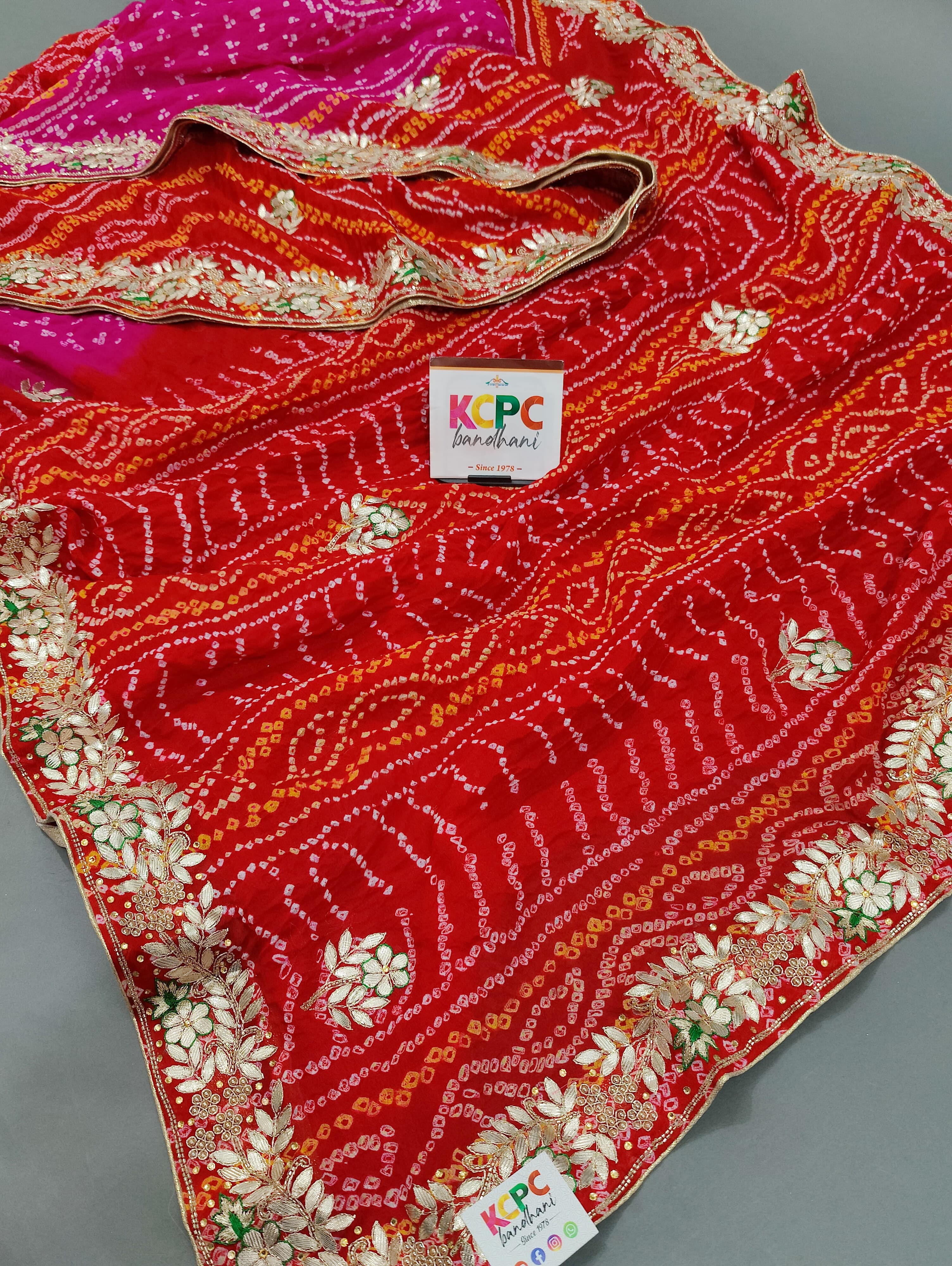 Georgette Bandhej With Gotapatti Sequence Saree in red and pink colour