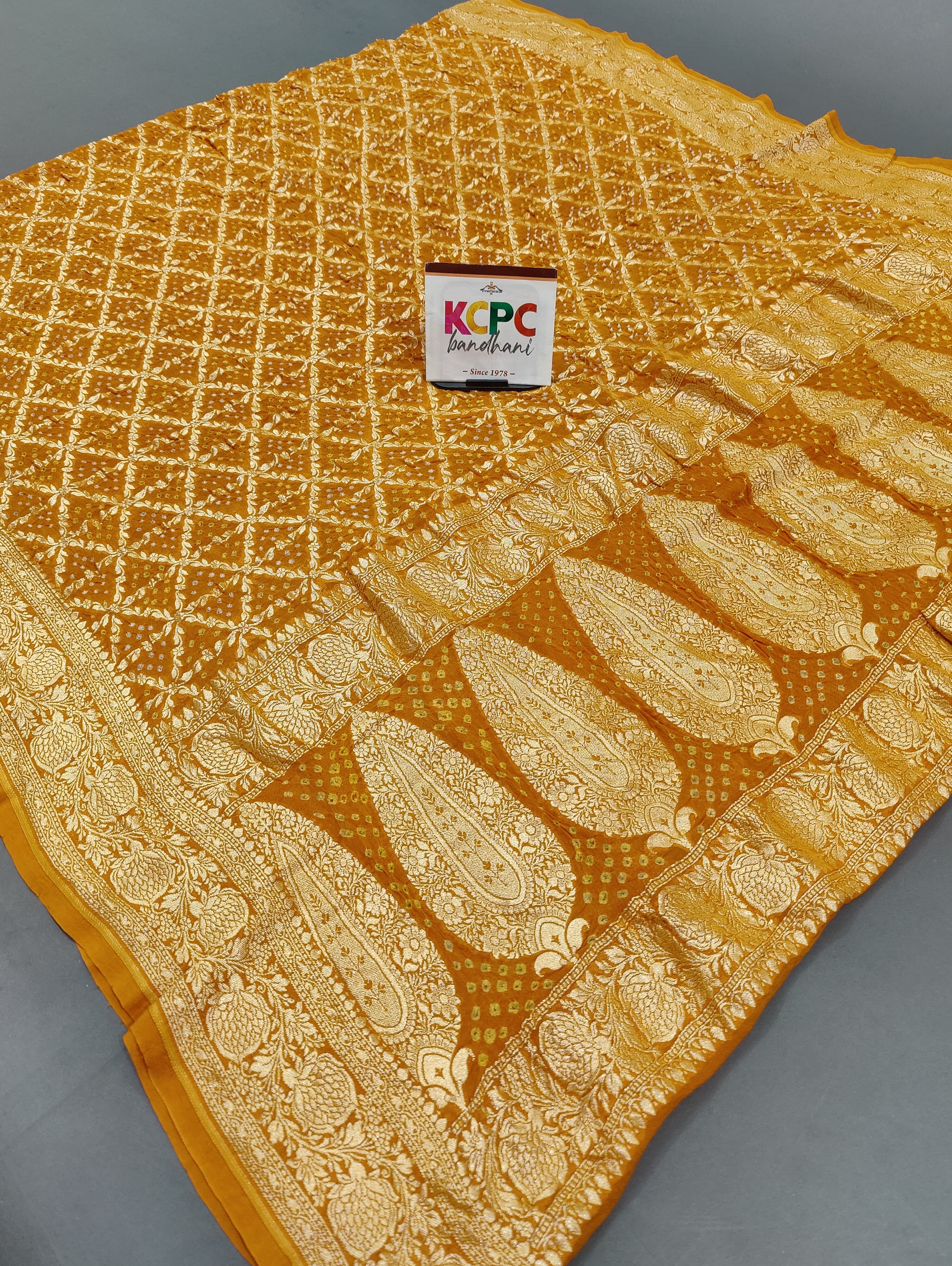 KcPc New Launch Pure Khaddi Georgette Upada Neemzari Bandhej DupattaMustard