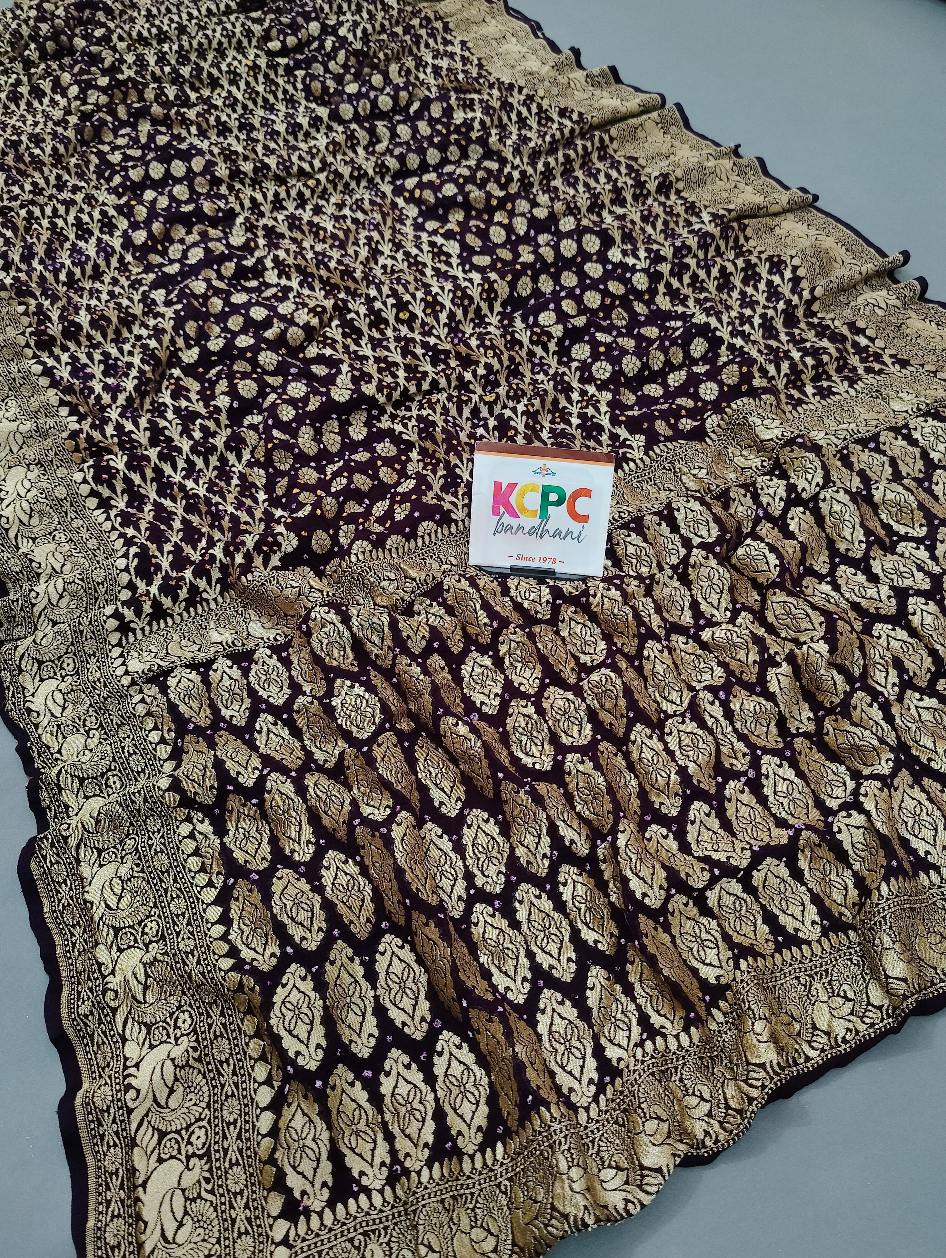 KcPc New Launch Pure Khaddi Georgette Upada Neemzari Bandhej Saree Dark Purple