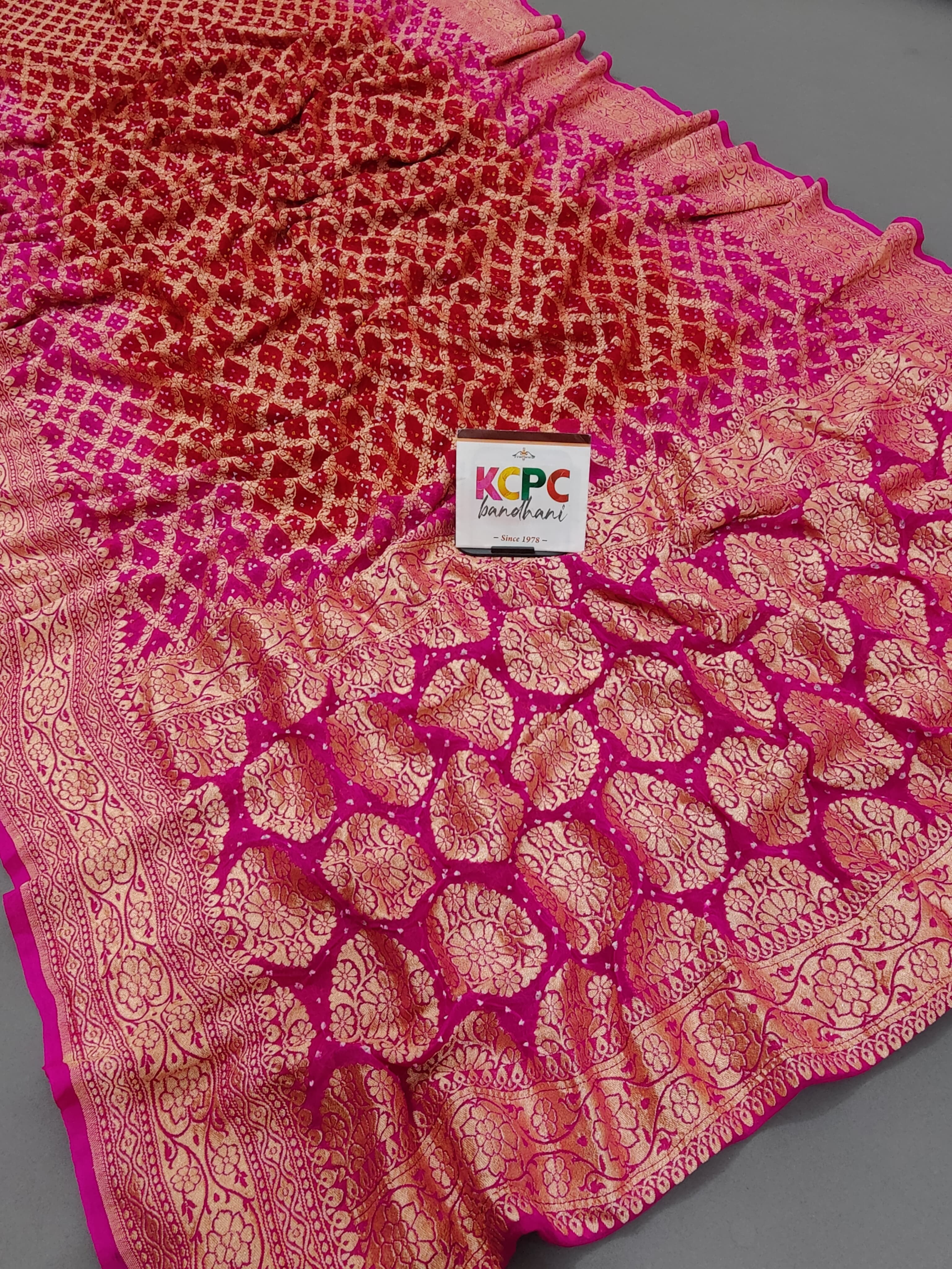 KcPc New Launch Pure Khaddi Georgette Upada Neemzari Bandhej SareeRed Rani