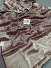 A folded KcPc brand pure khaddi georgette saree in wine color with golden banarasi zari weaving