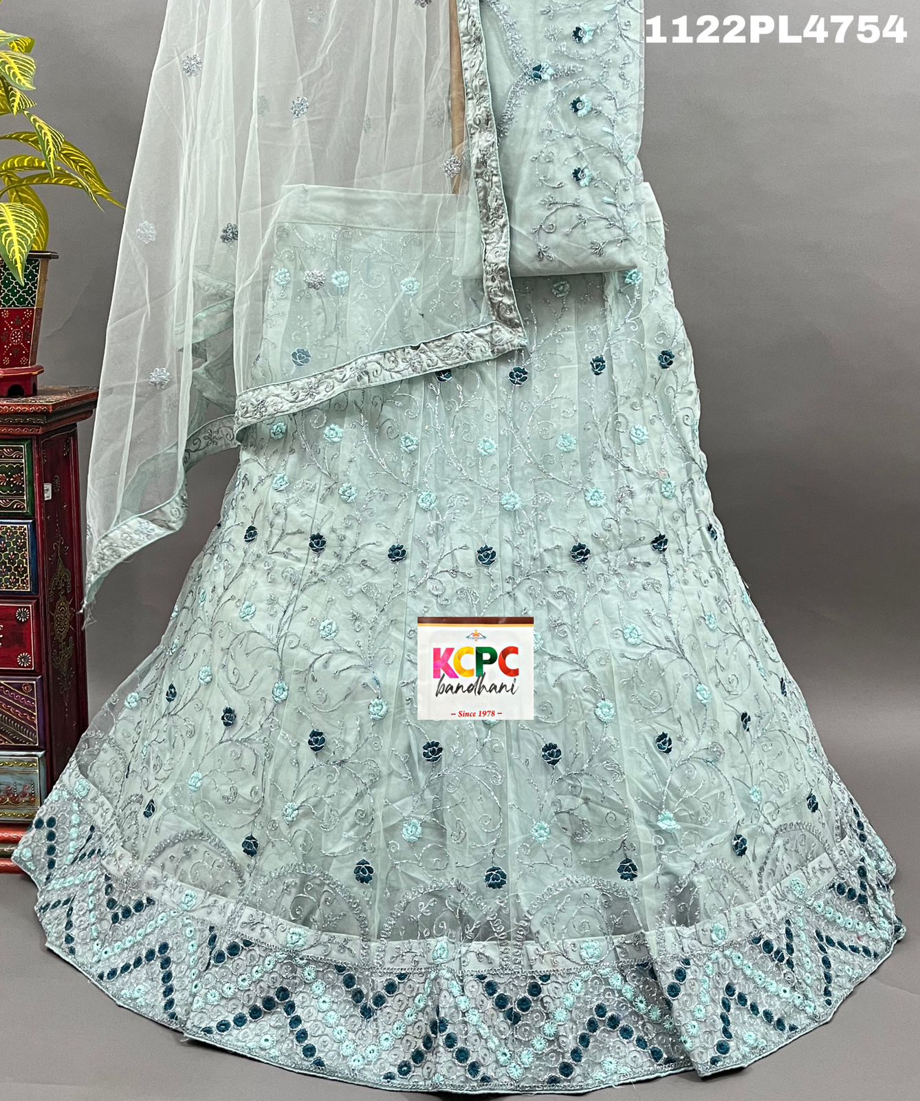 A Lehenga set net fabric with sequins and embroidery work