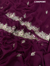 A wine-colored chiffon saree with Mukesh work