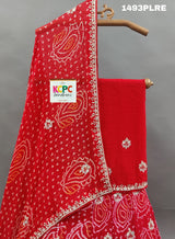 A red lehenga with gota work