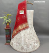A red and white traditional lehenga with bandhani dupatta and zardoji gotapatti work
