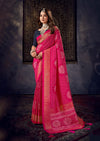 A traditional pink saree with mirror work
