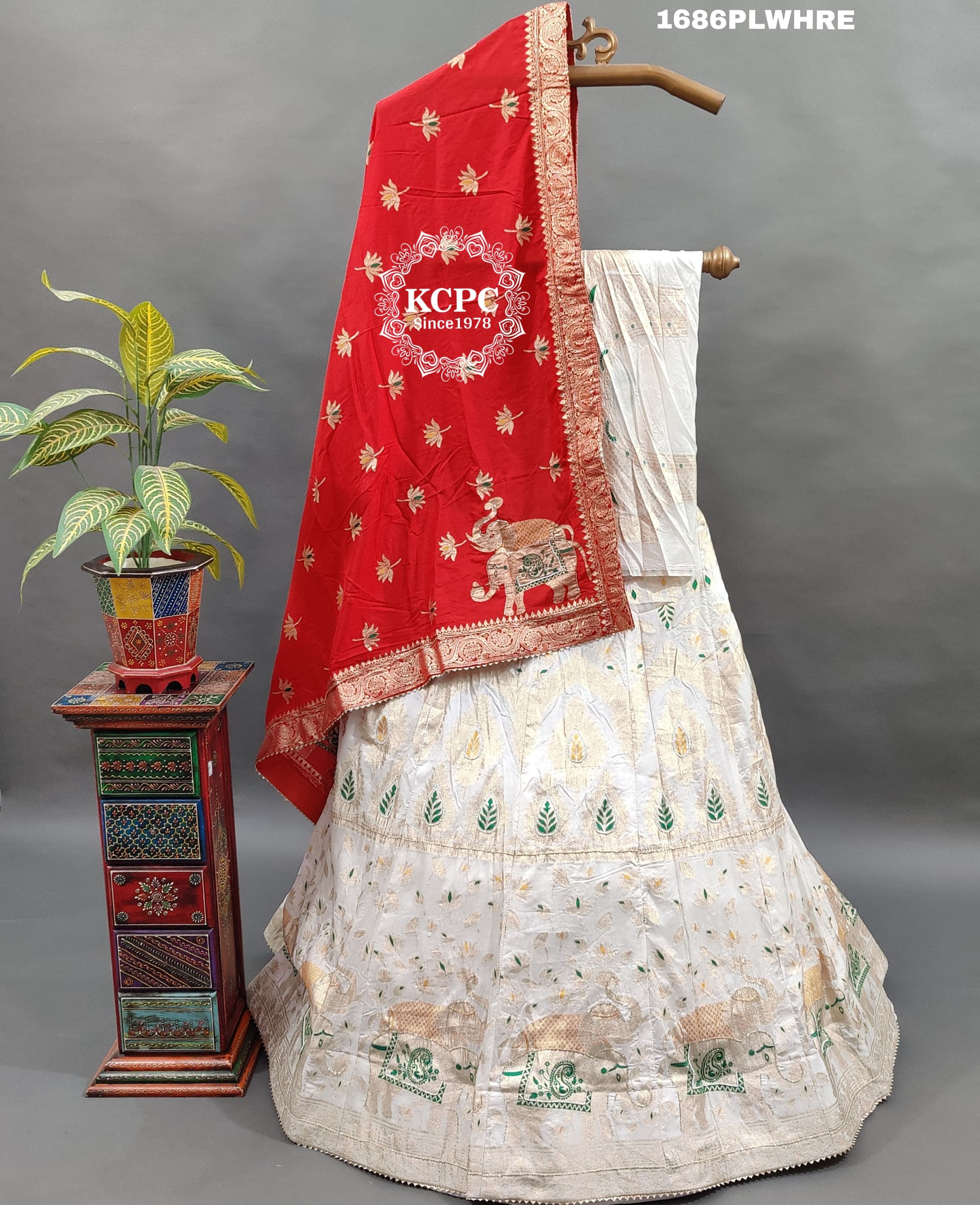 A traditional red and white Banarasi silk lehenga