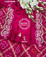 A pink and red pure gaji silk saree with bandhani style