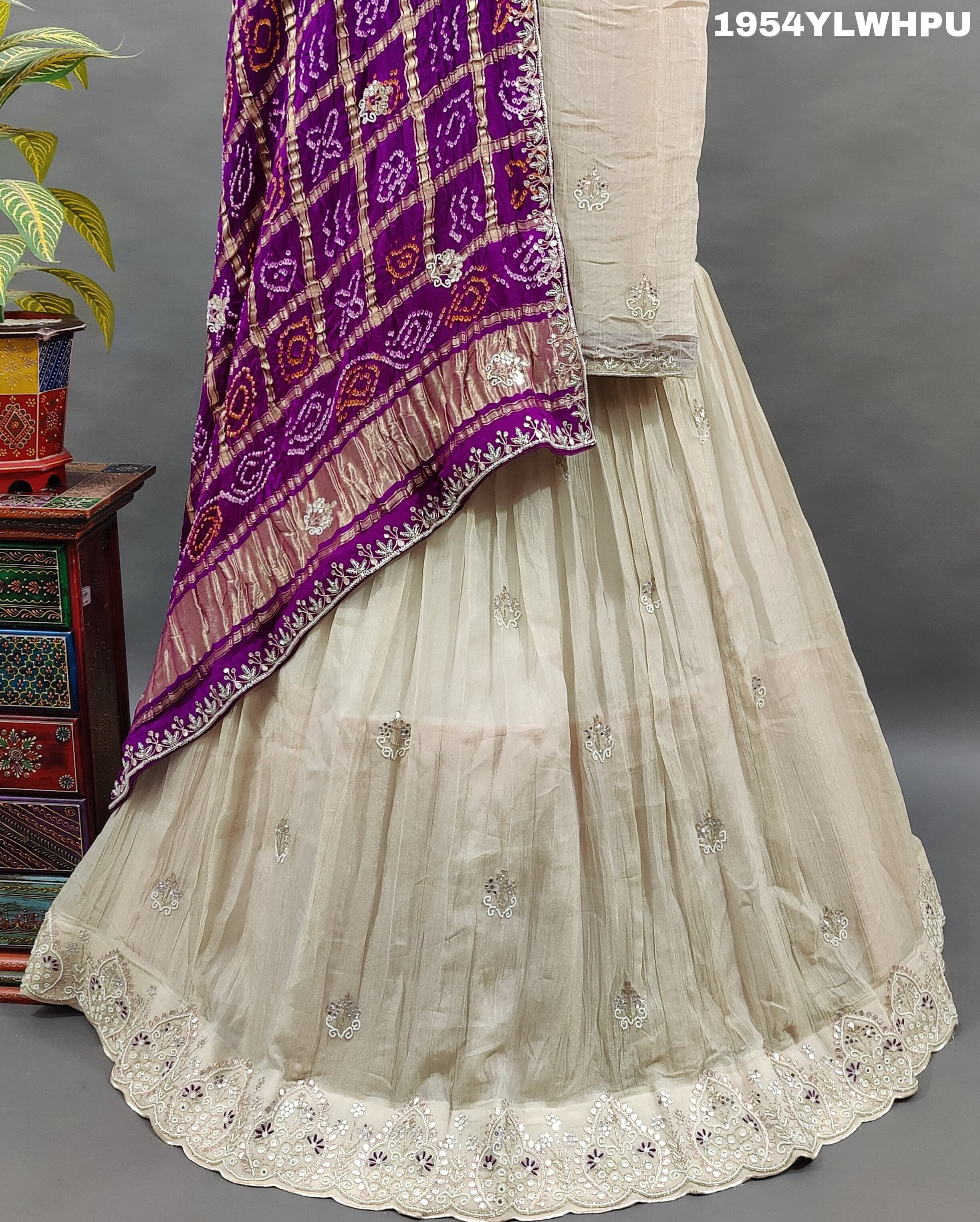 A pure Upada silk lehenga with a Gaji silk Bandhani dupatta set