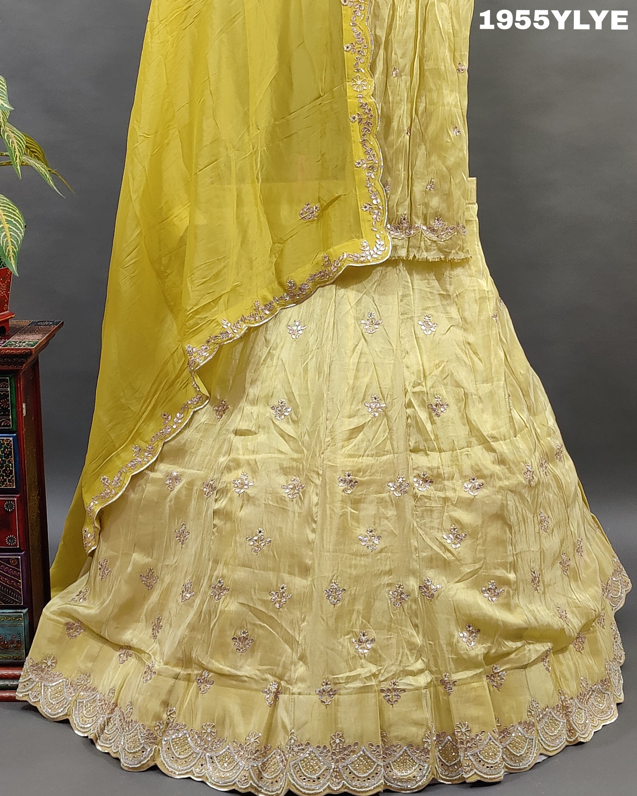 Yellow silk lehenga set withgota pati work