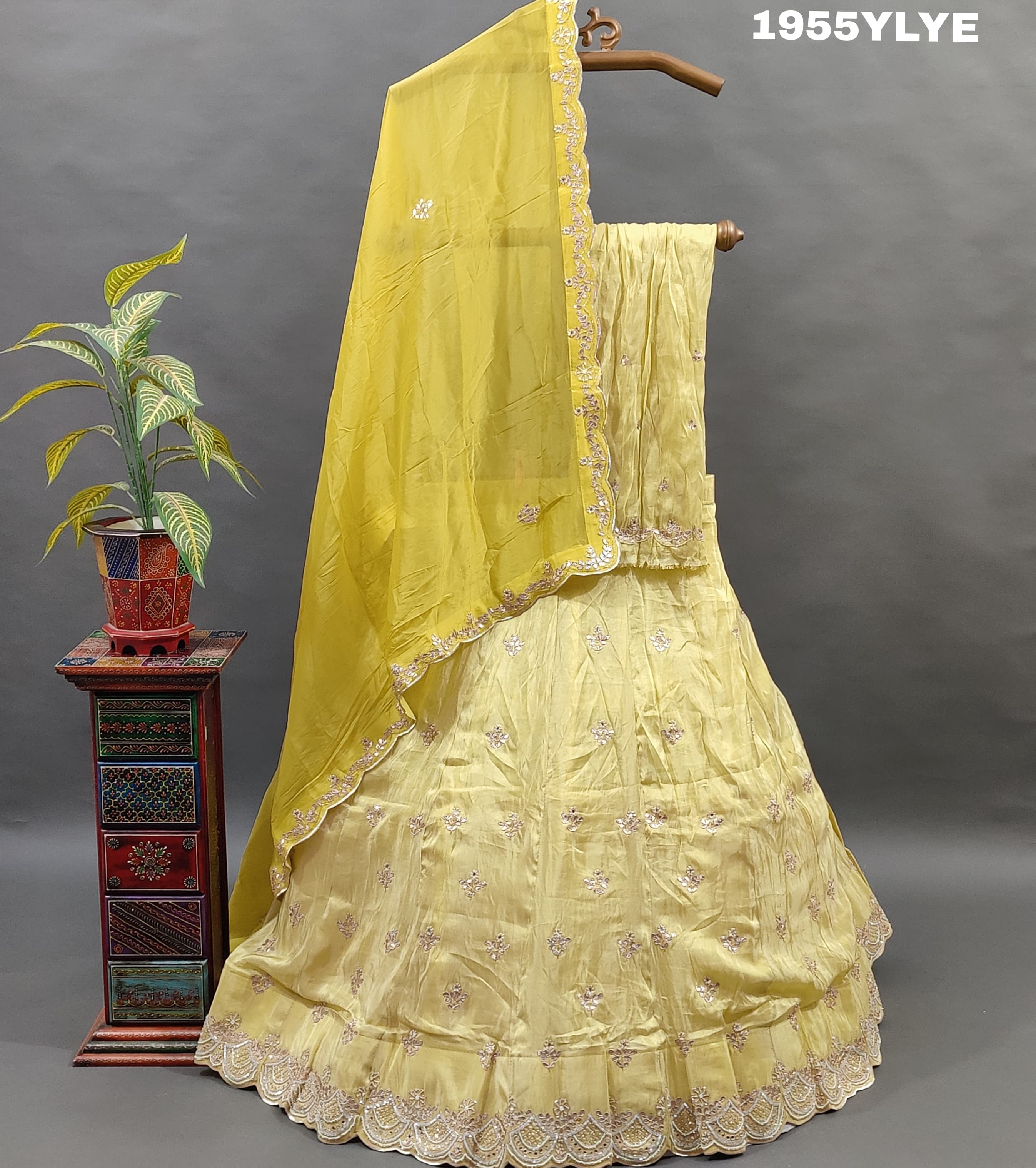 Yellow silk lehenga set withgota pati work