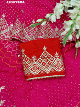 A pink saree with Bandhej pattern and Gotapatti work