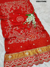 A red Gaji silk dupatta with bandhani style