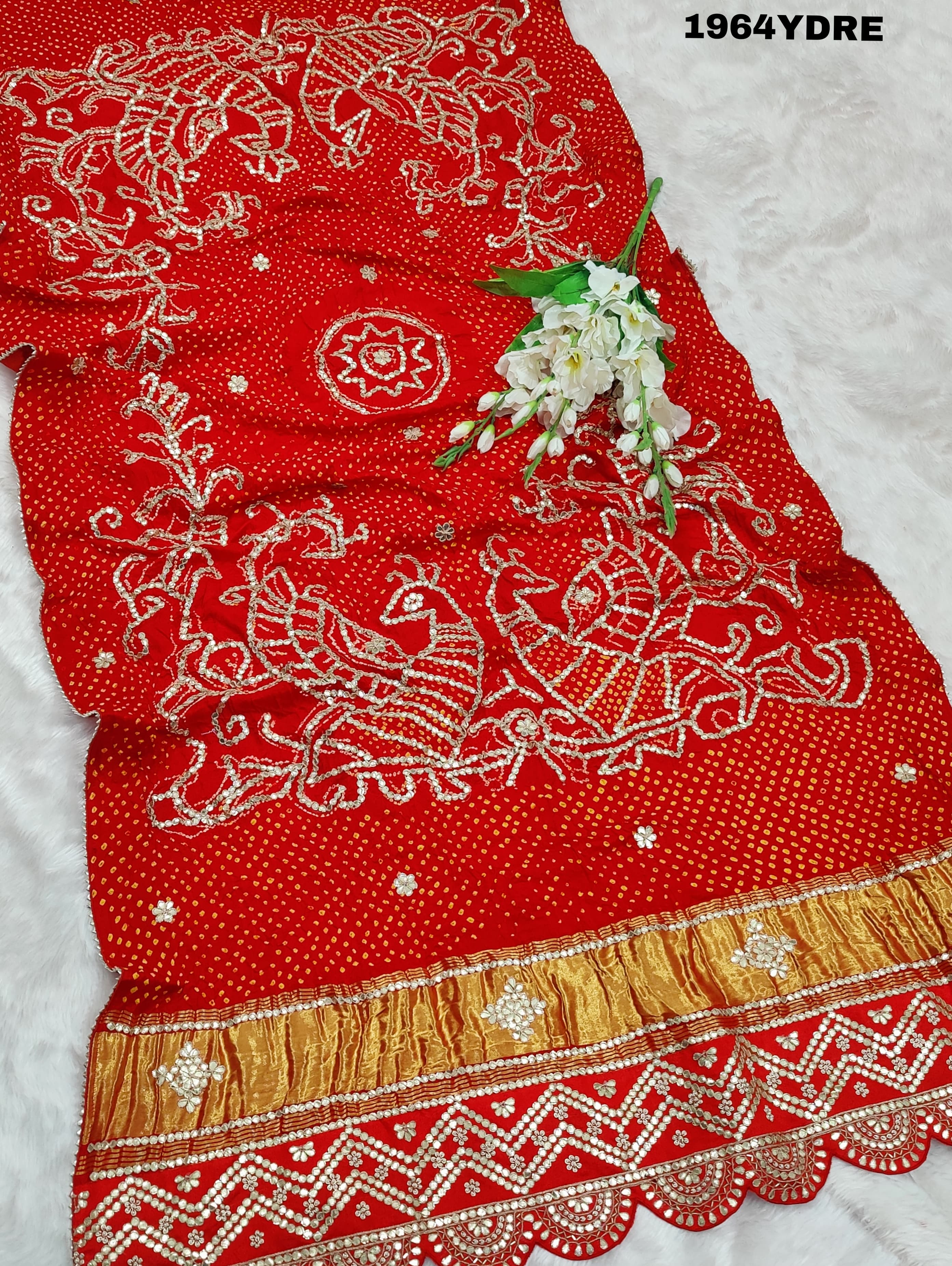 A red Gaji silk dupatta with bandhani style