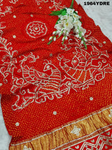 A red Gaji silk dupatta with bandhani style