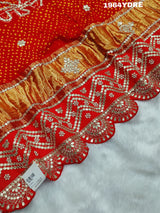 A red Gaji silk dupatta with bandhani style
