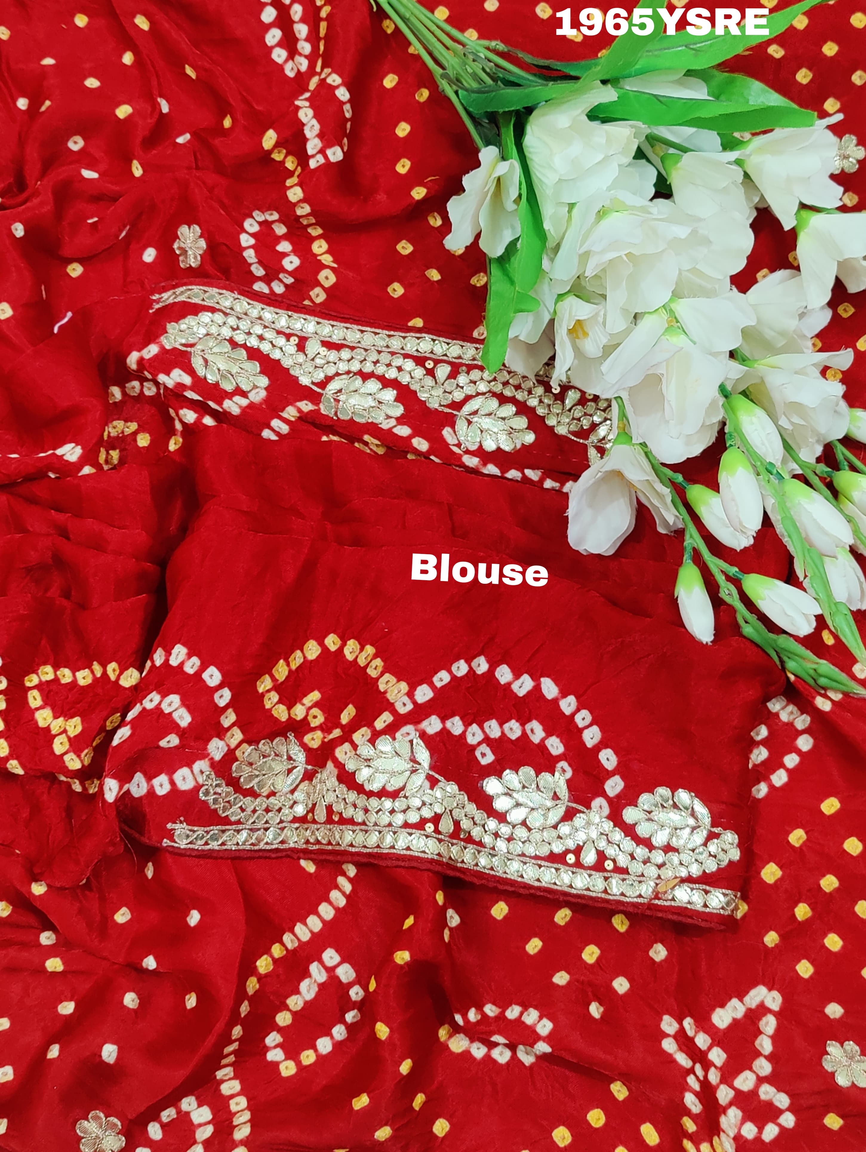 A red and gold modal silk saree with gota patti work