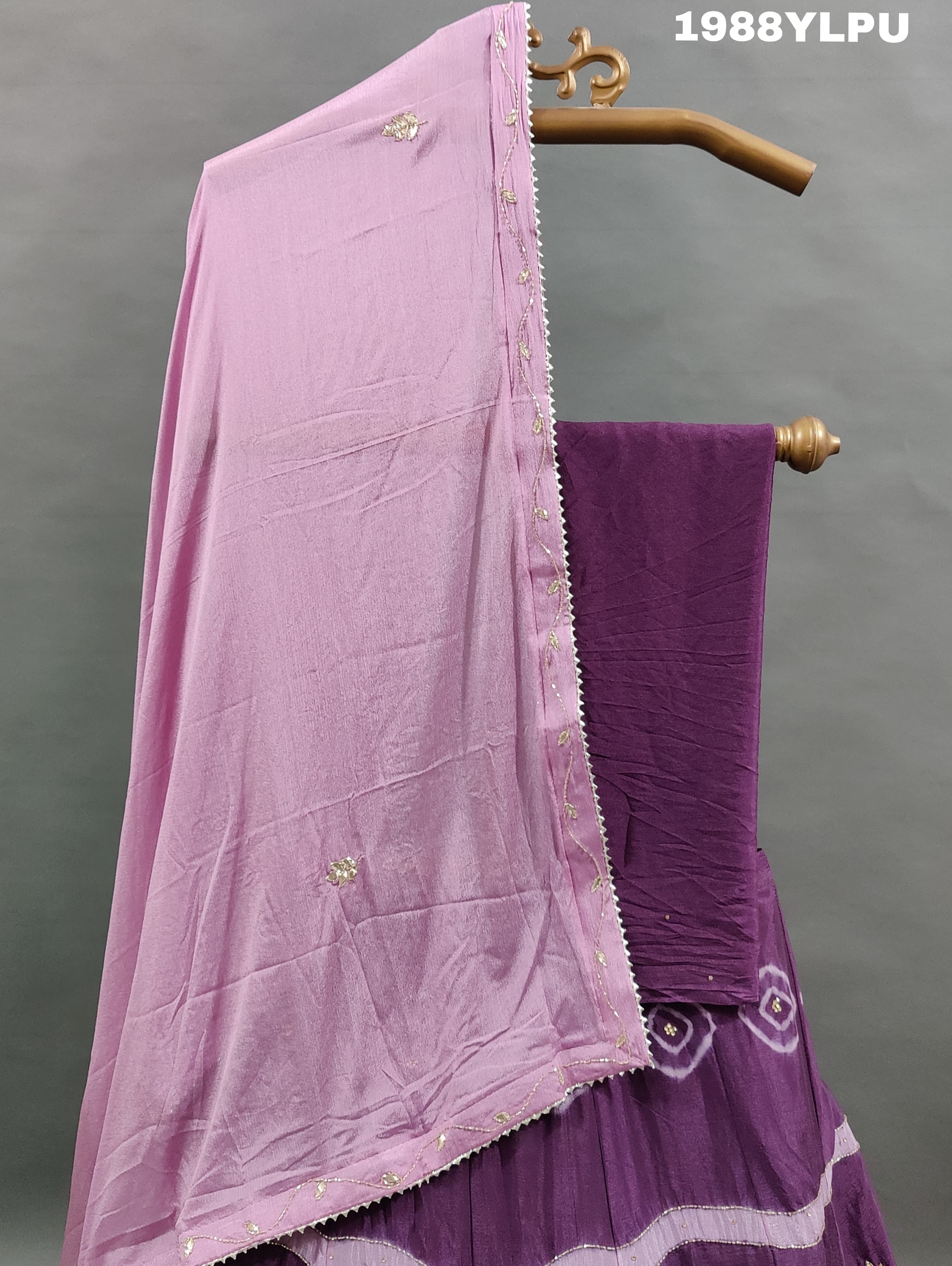 A pure upada silk lehenga set with cutdana workin purple color