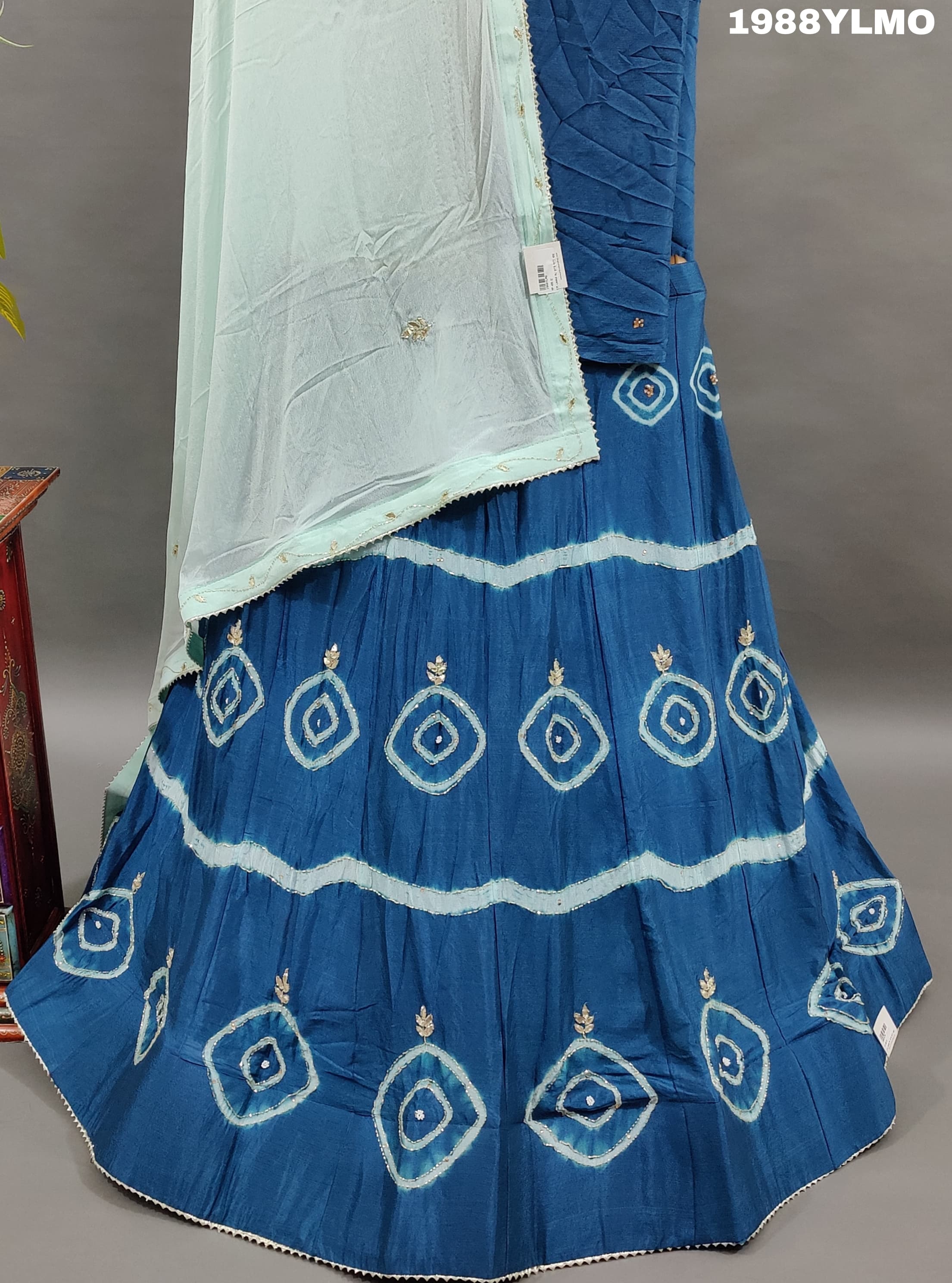 A Pure Upada Silk lehenga set with bandhani pattern and cutdana work