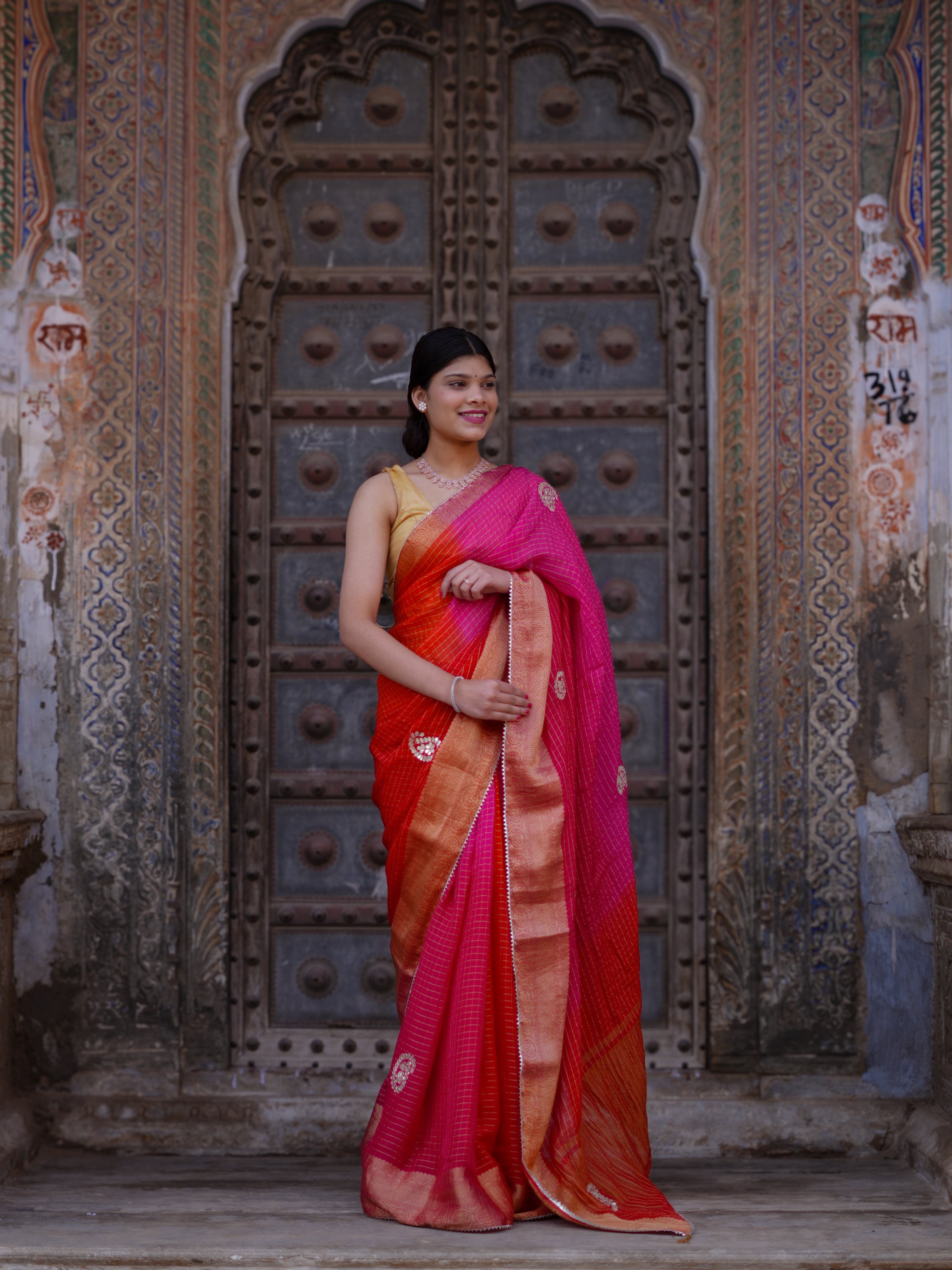 KcPc New Premium Georgette Saree in Banarasi Style with Gotapatti DetailingSatish