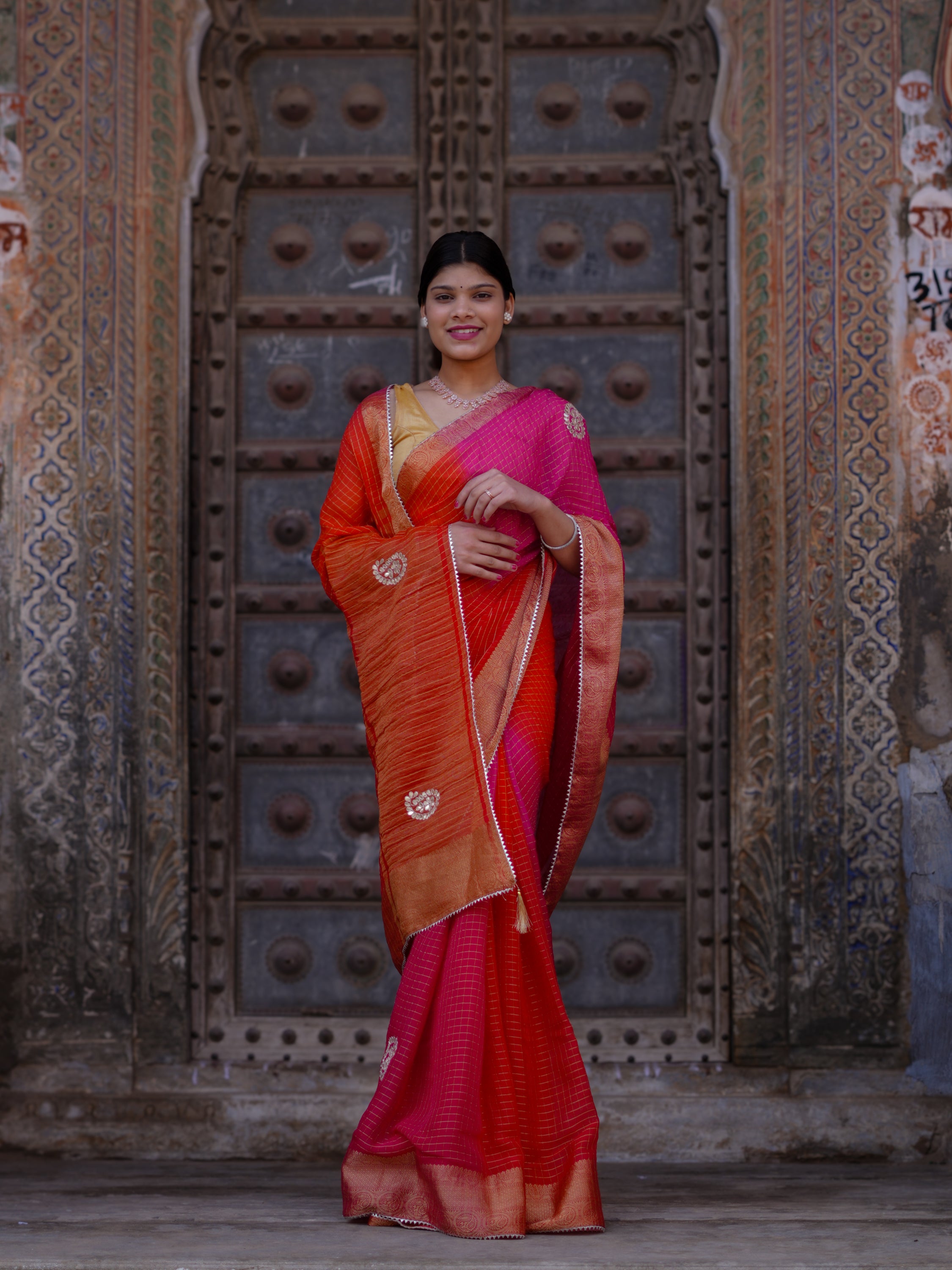 KcPc New Premium Georgette Saree in Banarasi Style with Gotapatti DetailingSatish