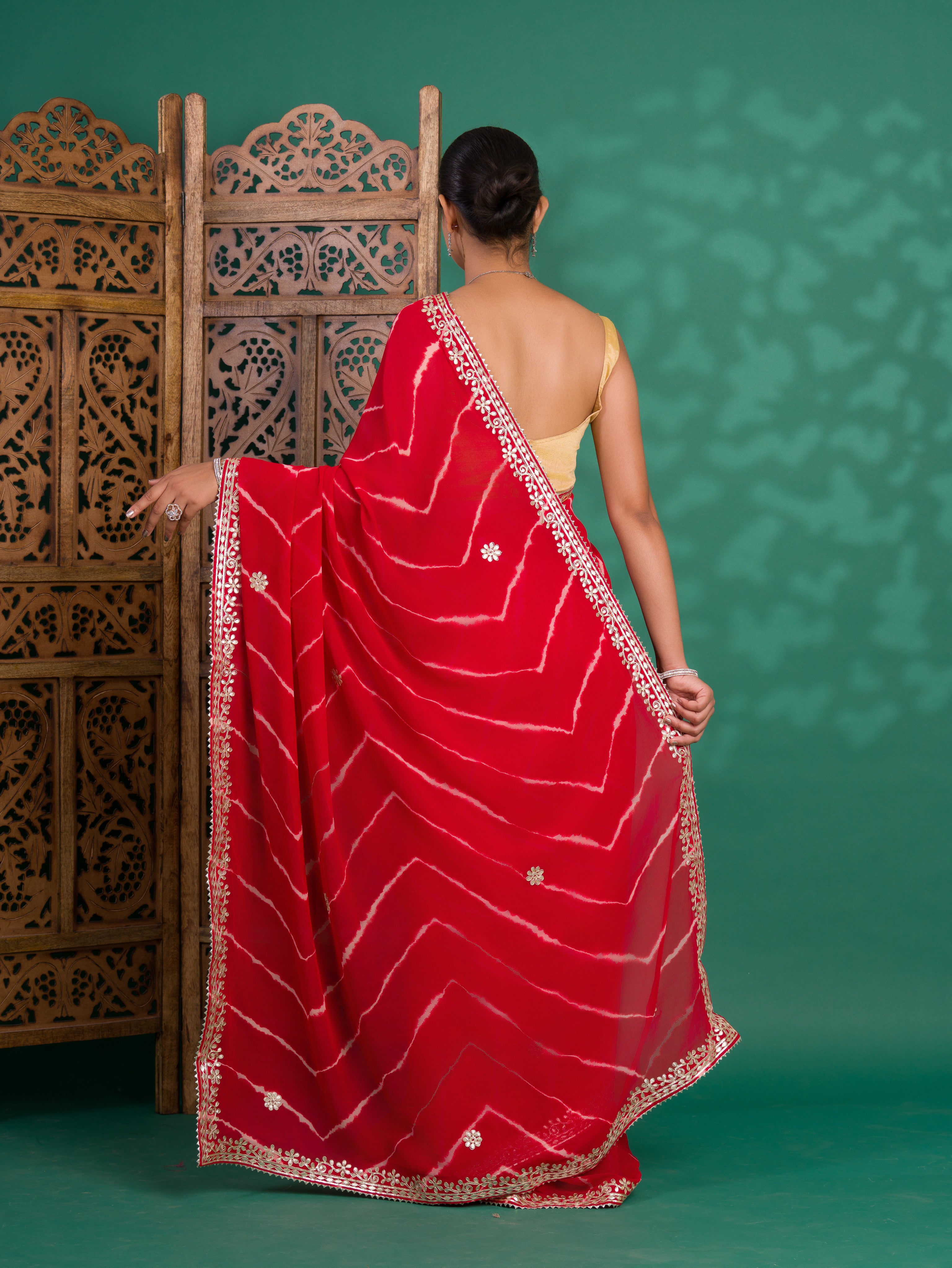 Chiffon Leheriya Style Wih Gotapatti Work Saree in red colour