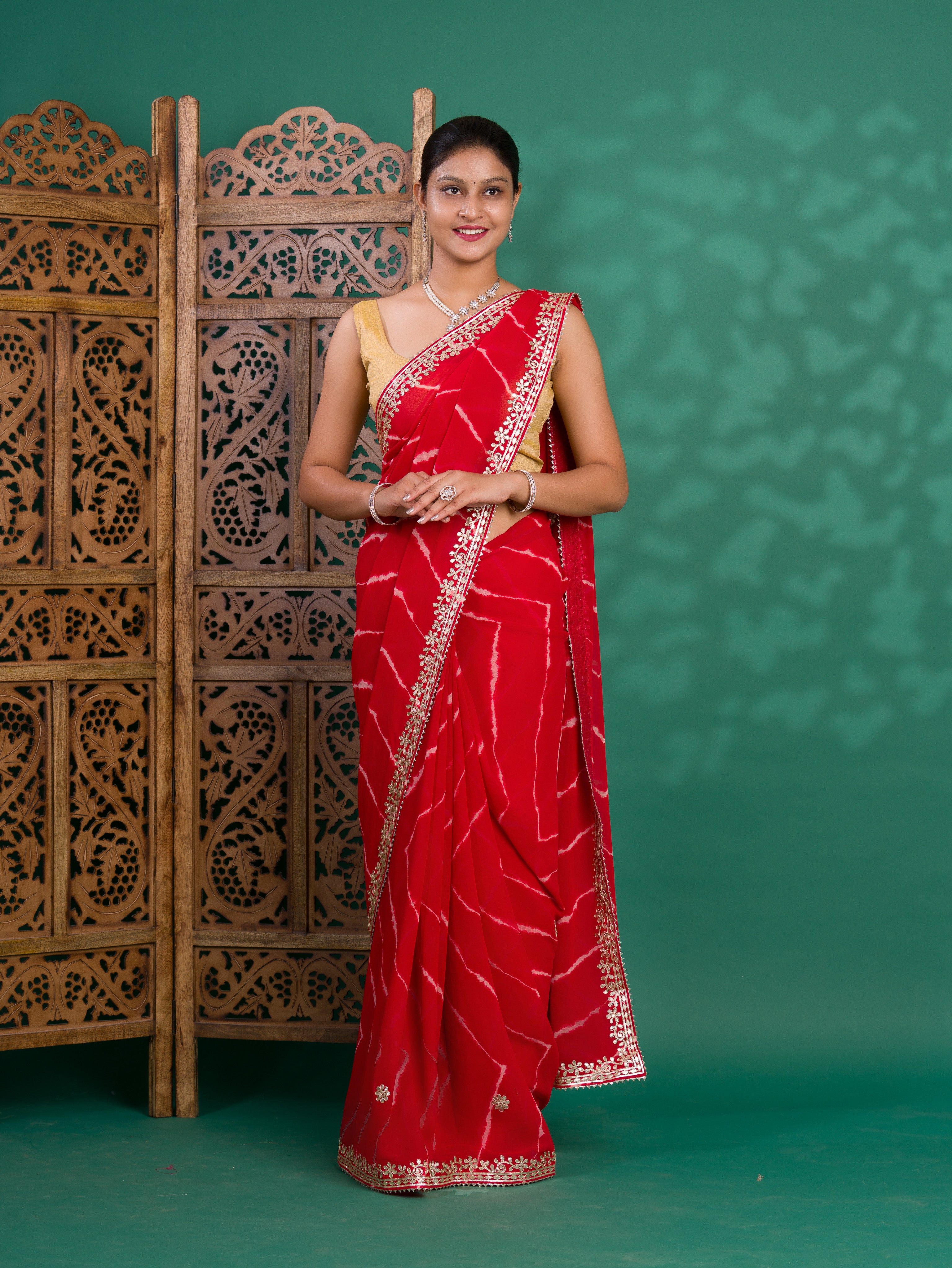 Chiffon Leheriya Style Wih Gotapatti Work Saree in red colour
