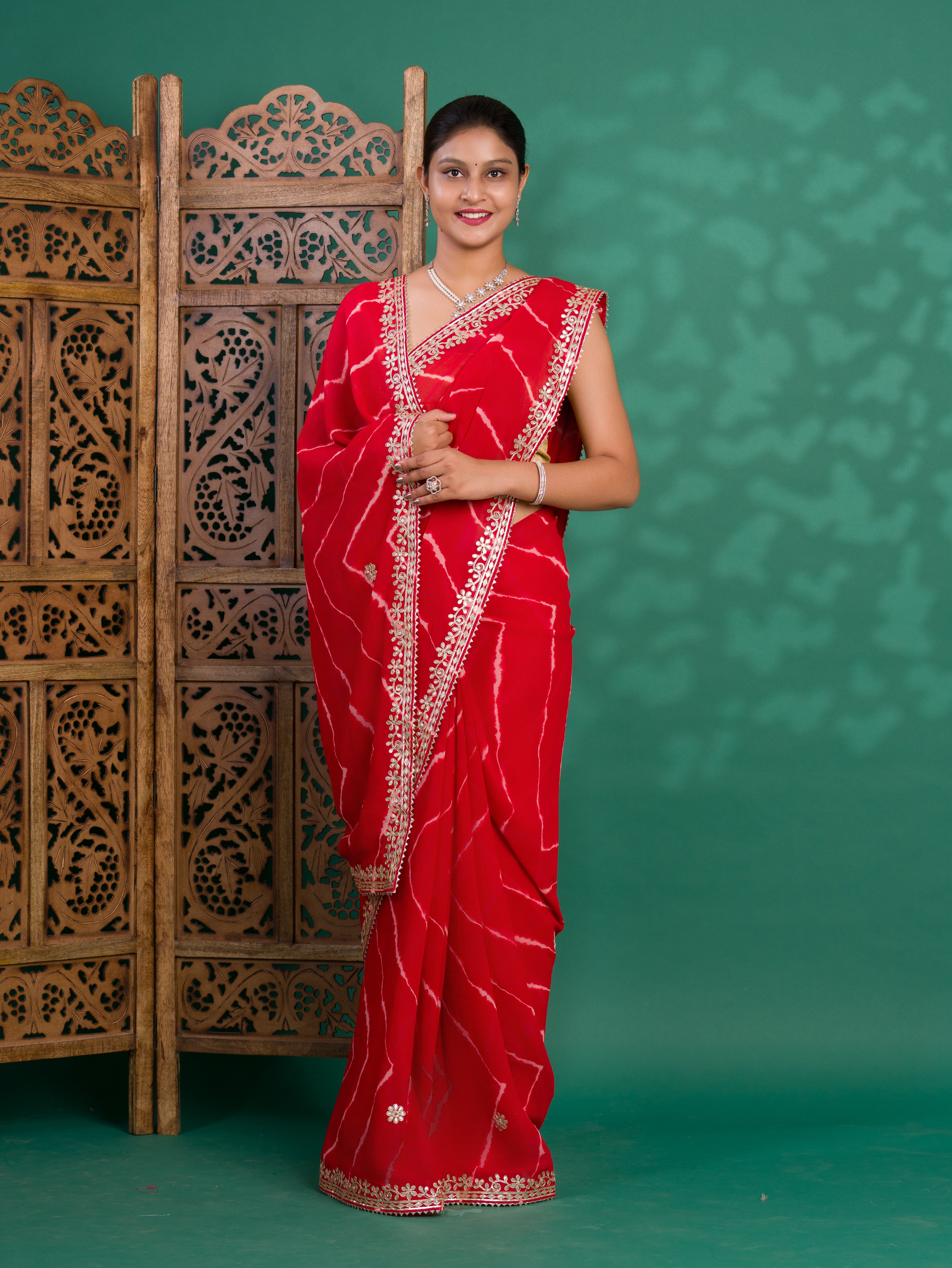 Chiffon Leheriya Style Wih Gotapatti Work Saree in red colour