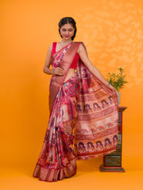 A saree with a kalamkari style pattern in maroon colors, with zari weaving and a Banarasi border. under 1000