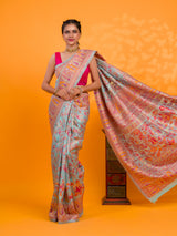 A orenge cotton silk saree with Kashmiri style patterns and Meenakari weaving work.