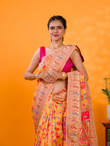 A yellow cotton silk saree with Kashmiri style patterns and Meenakari weaving work.