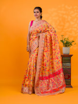A yellow cotton silk saree with Kashmiri style patterns and Meenakari weaving work.