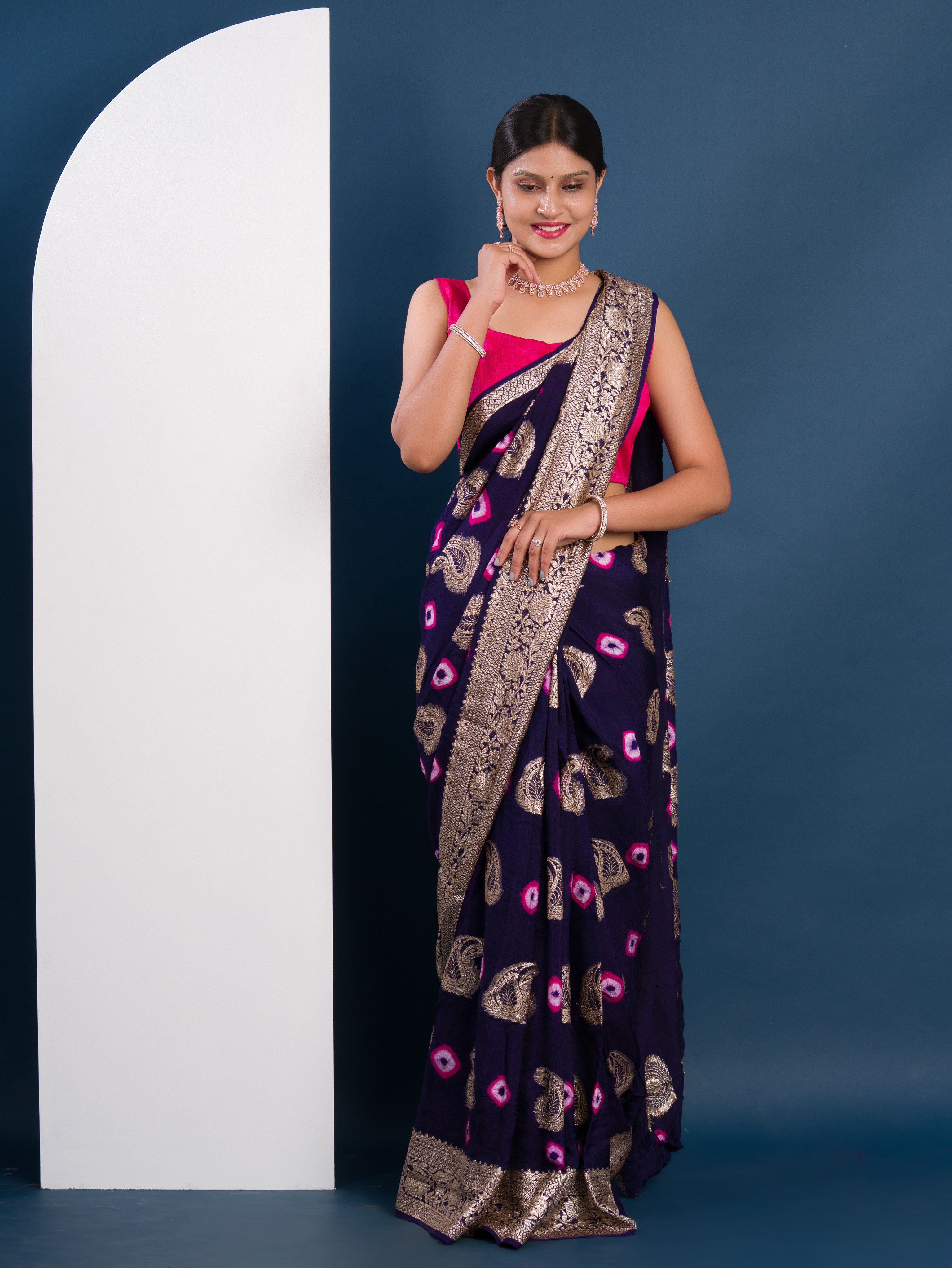 navy blue saree with gold and pink pattern with Bandhani Zari Weaving Work