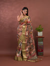A saree with a kalamkari style pattern in green colors, with zari weaving and a Banarasi border. under 1000